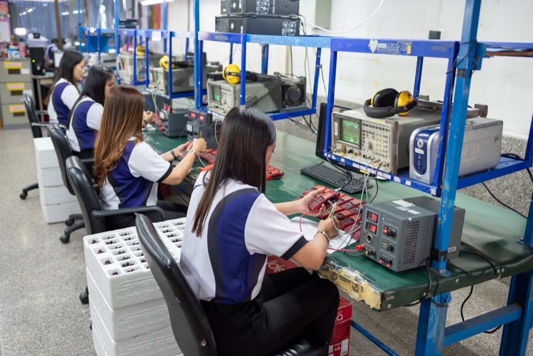 Production and assembly line with staff at TCCOM